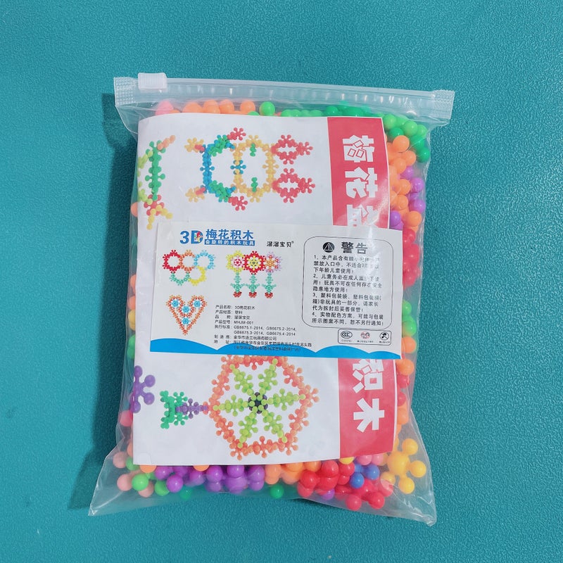 Manufacturers Send Plum Blossom Building Blocks 3D Three-Dimensional Rotatable Snowflake Plastic Assembling Kindergarten Toys - Image 1